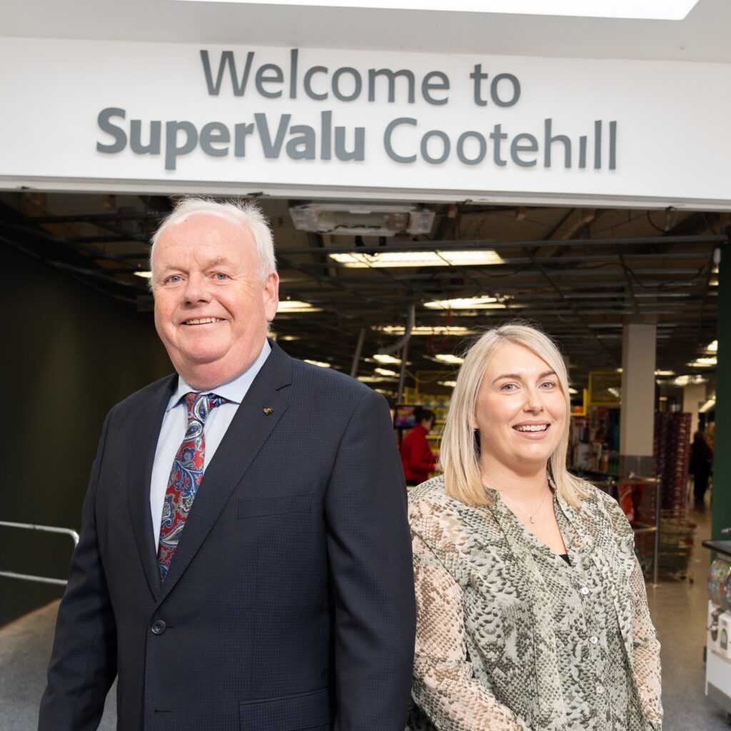 John and Kelly Foy standing in front of Supervalu Cootehill
